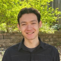 Portrait of Ian Atkins, Lead AI Architect at Zuma Innovations